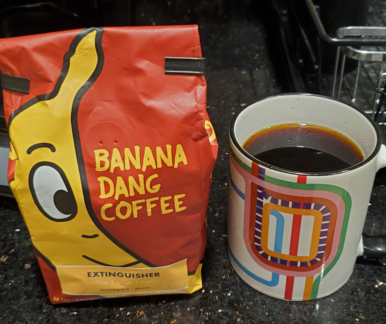 Banana Dang Extinguisher coffee next to my Chicago CTA mug.