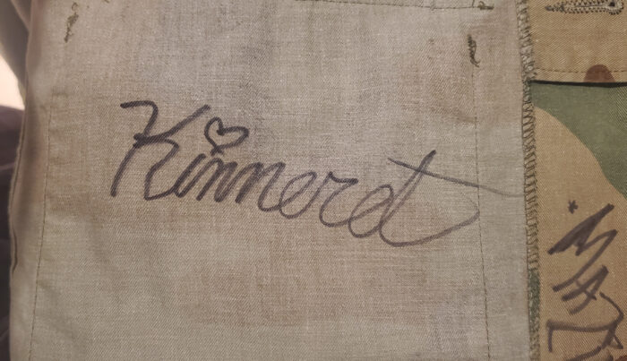 Kinneret's heart autograph in washproof marker.