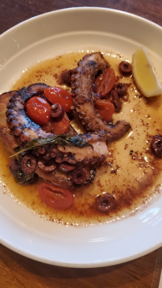 Octopus with potato, cherry tomato, black olive, lemon, red wine vinaigrette