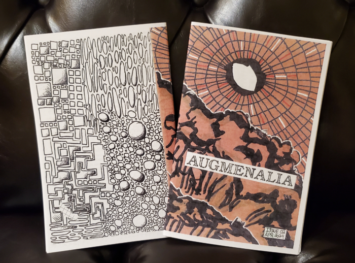 Back cover and front cover of Augmenalia Issue #02.