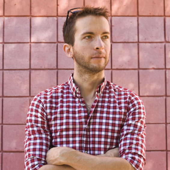 A professional photo of Ethan James Hulbert in a nice button up shirt.